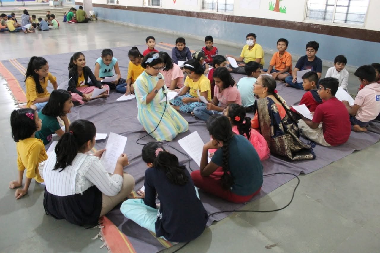 Children seated together in a guided Gopal Fun School learning circle